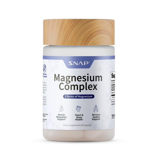 Supplement jar labeled 'Magnesium Complex' with a wooden cap on a white background